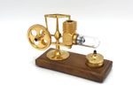 HOG Motor Micro Stirling Hot Air Engine Gold Finish on a Wooden Base Plinth