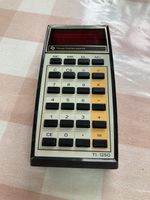 Texas Instruments  Calculator T1-1250 Made in ITALY