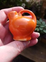 Geiger Counter Check Source,  Pepper pot,shaker in the shape of a small teapot..
