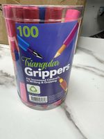 100 X Triangular Pencil Grippers, Assorted Colours In Tub.