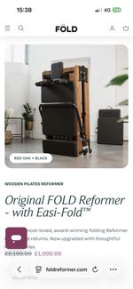 FOLD Reformer Folding Pilates Bed In Red Oak And Black Leather.