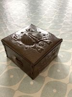 A Newlyn Arts And Crafts Copper Box Decorated With Fish And Shells