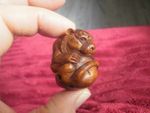 Hand Carved boxwood netsuke of a tiger curled into a ball collectable figure
