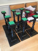 Set of six military helmet display stands, solid wood.”12 tall.