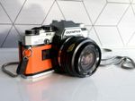 Olympus OM10 35mm SLR Film Camera w 28mm Lens /  NEW SEALS / Orange Leatherette