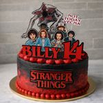 Personalised name and age upside down theme cake topper.