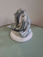 Hand Carved Marble figurine of three dolphins on a marble base.