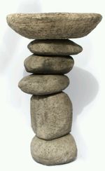 Contemporary pebble bird bath / bird feeder. 