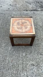 A Vintage 1960/70s Modern Danish style teak side table with a ceramic tiled top.