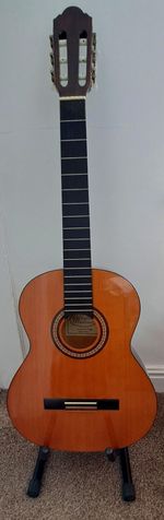 Santos Martinez Classical Guitar in very good condition, with stand.  