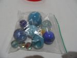 A Collection Of 12 Vintage Glass Marbles mainly blue