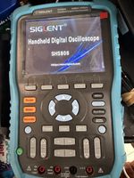SIGLENT  SHS806 Handheld Digital Oscilloscope.