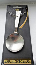 Guiness pouring spoon on card
