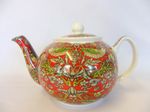 A 2 cup teapot in William Morris Red Strawberry Thief design.