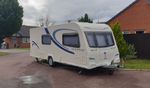 Bailey Pegasus Milan II 2011 caravan with motor mover, awning and accessories