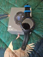 Garmin Instinct 3 AMOLED 50mm GPS Smartwatch black and blue bolt strap