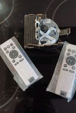 Barco color wheel assembly R9801432, 2 Barco Remotes R8799586. NEW.