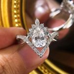 10x8MM Pear Cut Moissanite Curved  Band Engagement Ring In 14K White Gold Plated