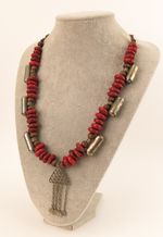 Ethnographic antique. Himalayan glass ‘Sherpa coral’, Kuchi silver necklace