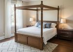 Teak four poster bed originally from Indonesia, purchased in the middle east