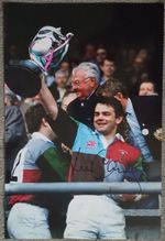 will carling celebrates with the trophy after the match signed 12x8 photo