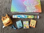 Pokémon TCG Prismatic Evolutions UPC Box, Eevee Deck Holder, Playmat. Bundle 