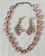 A stunning pink vintage paste stone necklace and earrings
