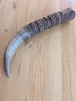 A large African Carved Wood and Cow Horn Oliphant, carved With Exquisite Detail