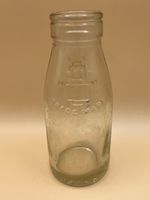 Antique childs glass milk bottle.