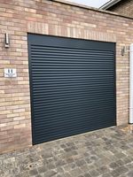 Electric Roller Garage Doors With Safety Edge Kit. 2 X Remote Controls .