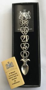 Pewter Love Spoon. With 21, Dragon, Cross, Daffodil and Horse Shoe Motifs