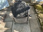 Vintage Fire grate with attached back plate. This is heavy cast iron fire grate.