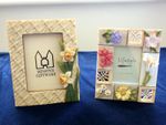 TWO  PHOTO FRAMES, ONE MINSTER & ONE LIFESTYLE,BOTH WITH CHINA FLOWER EDGING.