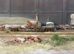 OO gauge wagon: Weathered Rocket loco on a low loader. Ref J8