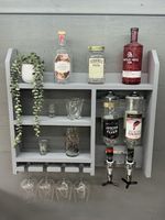 Wall mounted optics shelf