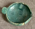 Ancient Middle Eastern blue glaze ceramic open reservoir oil lamp
