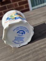 The mug is a 1990 fine bone china royal commemorative piece produced by Queen's