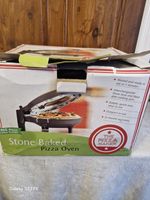 The  Pizza Maker with Stone Base And  Non Stick Electric Oven .