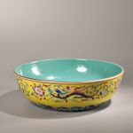 Yellow-Ground Famille Rose Porcelain Bowl with Chi Dragon and Floral Scroll Moti
