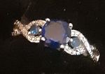 Blue glass prong set stone w/clear stone accents silver plated ring size 6.75