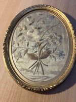 silk floral needlework in oval frame