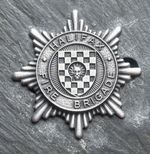 OBSOLETE HALIFAX  FIRE BRIGADE PEWTER BADGE.