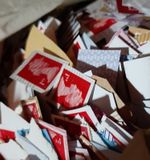 NICE LOT 1001+ 1st CLASS  RED CLOSER CUT SECURITY STAMPS ON PAPER