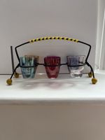 1950s Harlequin Glass X6 shot glasses in Sputnik Design wire holder.