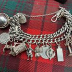 Sterling Silver Charm Bracelet  16 Silver/White Metal Charms, inc ingot 100 gms 