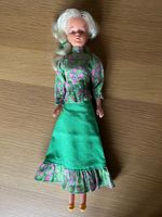 Vintage Tressy Doll and 4 outfits, 1970's, growing hair, plus key