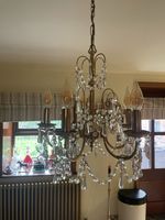 Antique multi-arm brass and crystal chandelier