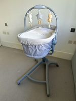 Chicco Grey Oval Bassinet with Stand, Portable, Hanging Animal Toy Bar