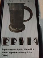 An Archibald knox  pewter jug