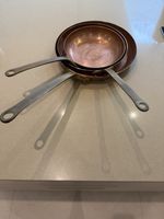 Set Of Three Copper Skillets, With Brass Or Bronze Handles Rivettes On. 